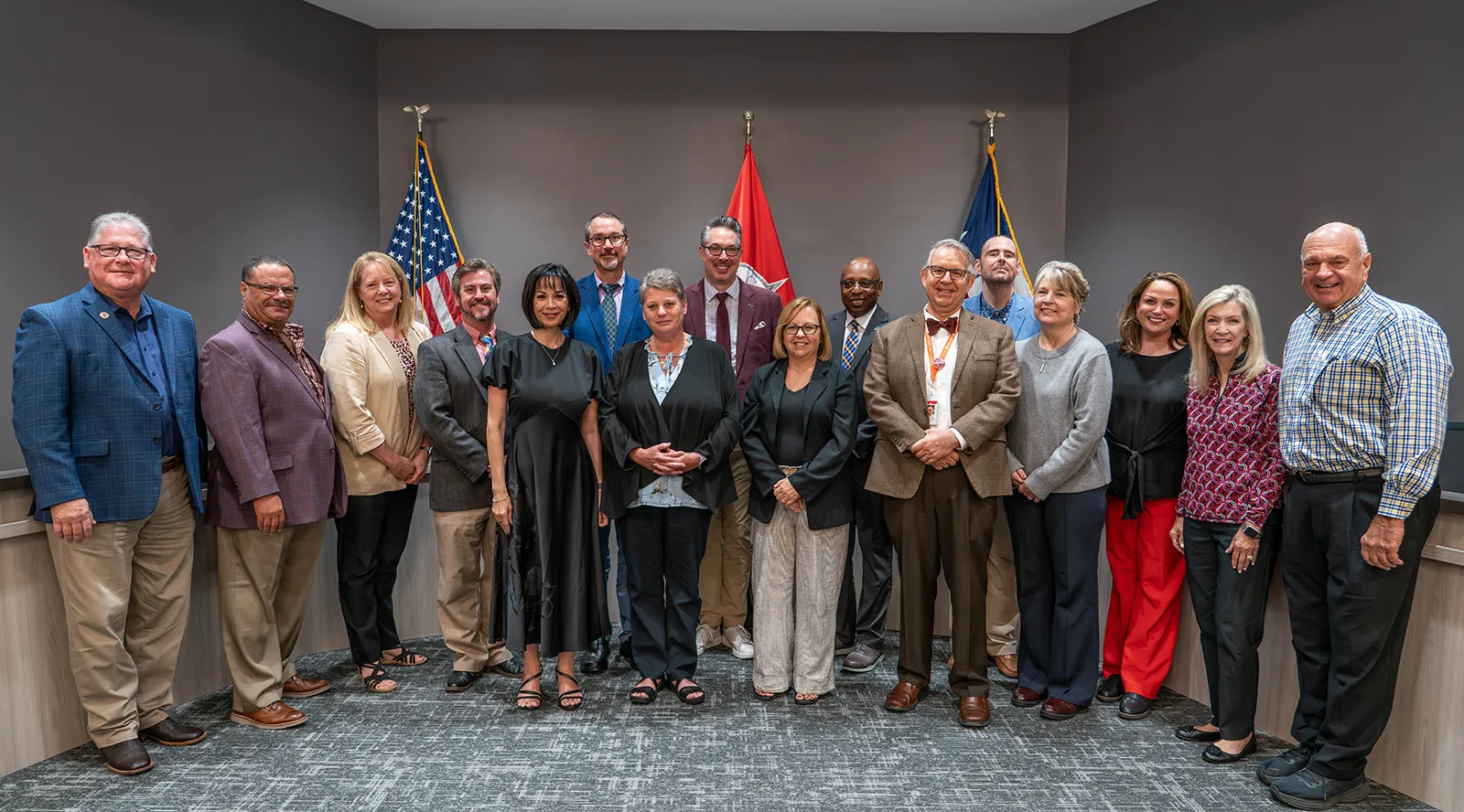 Student, Zoie Moore stands in front of a white backdrop